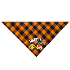 Dog wearing festive Thanksgiving plaid pet bandana