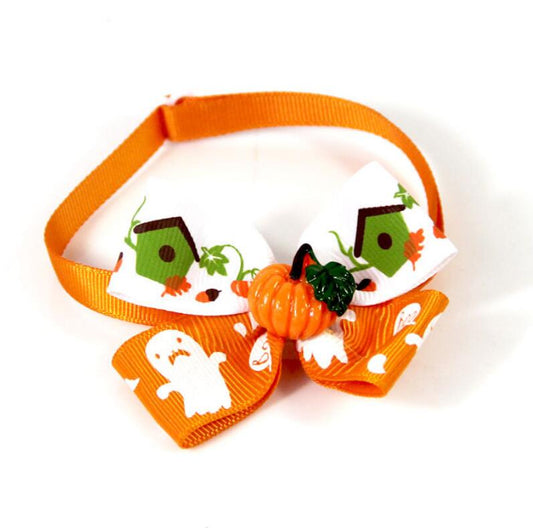 Dog bow tie with pumpkin-inspired Halloween styling
