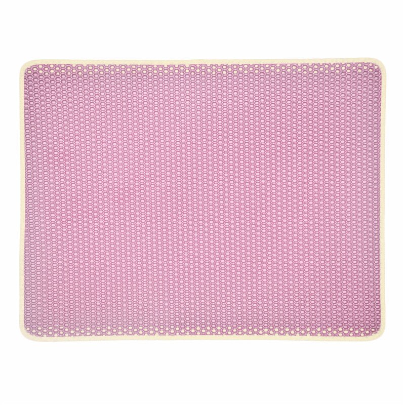 Cat litter tracking mat placed around a litter box