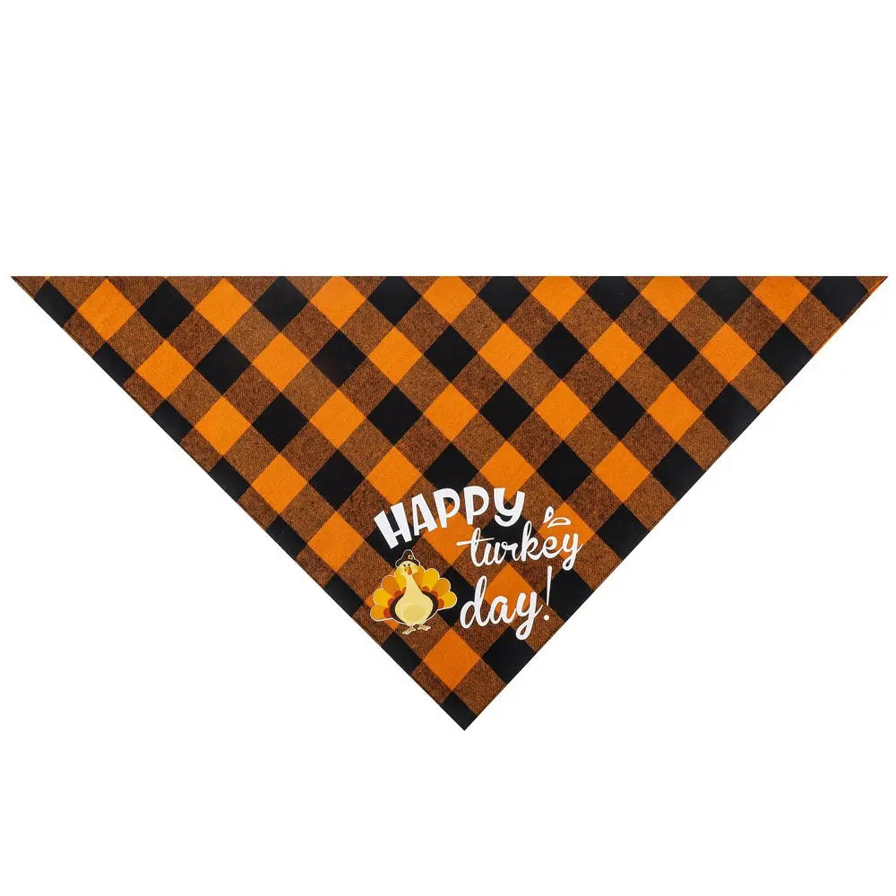 Dog wearing festive Thanksgiving plaid pet bandana